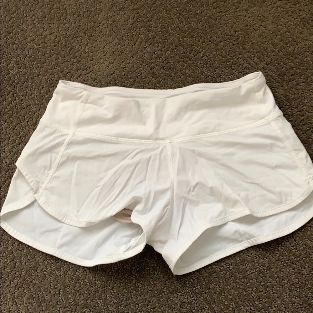 White lululemon running shorts